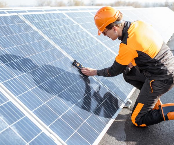 worker-installing-solar-panels-2021-09-02-01-01-29-utc